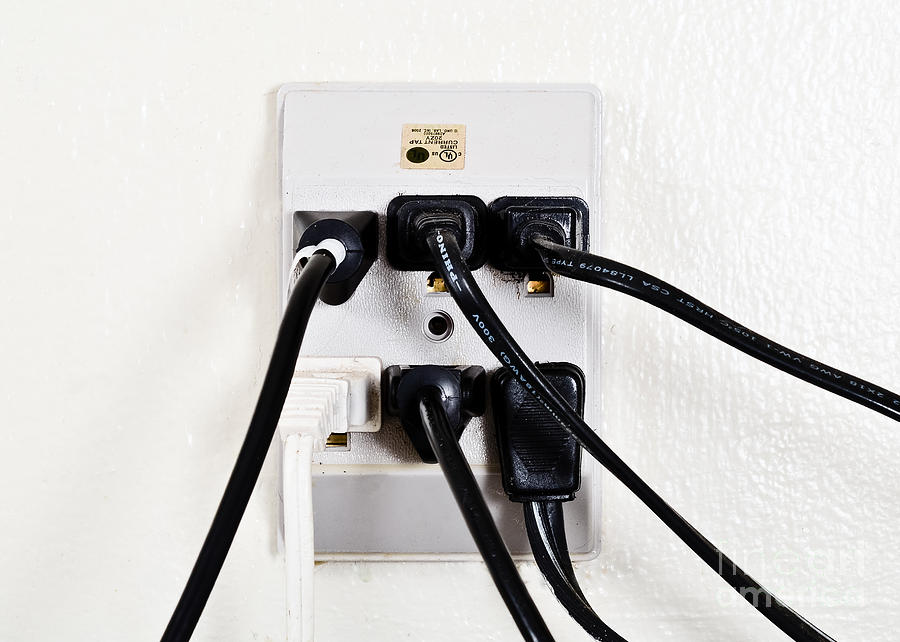 Overloaded Outlet Photograph by Photo Researchers