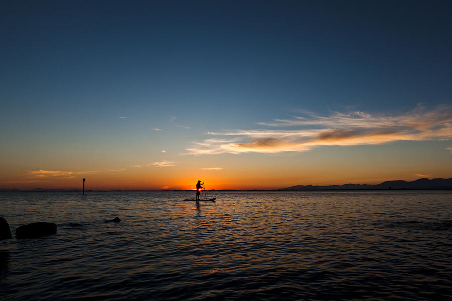 Paddle in the Sun Photograph by Monte Arnold