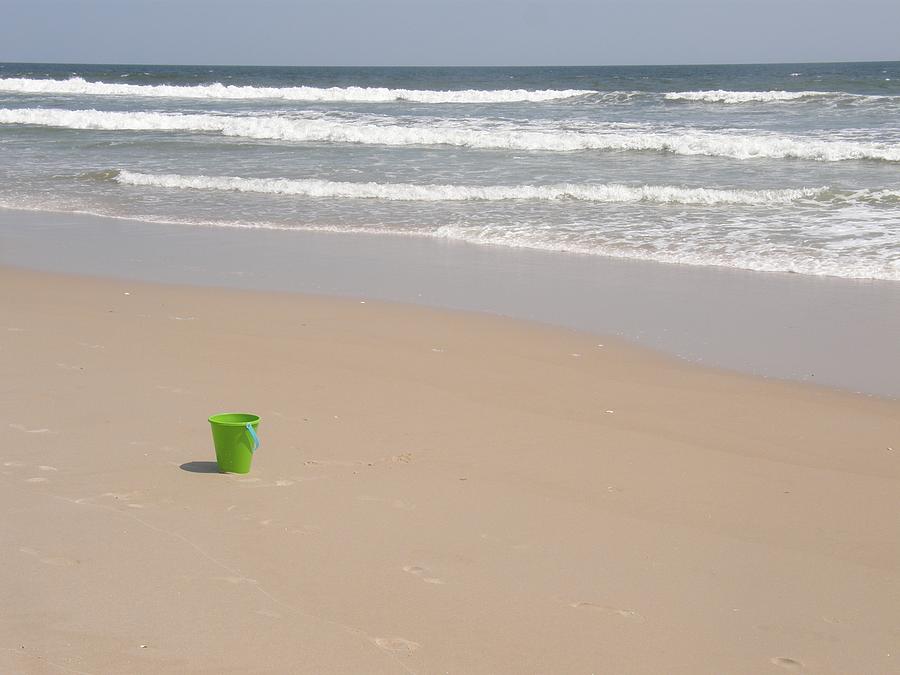 Pail on the Beach Photograph by Sven Migot