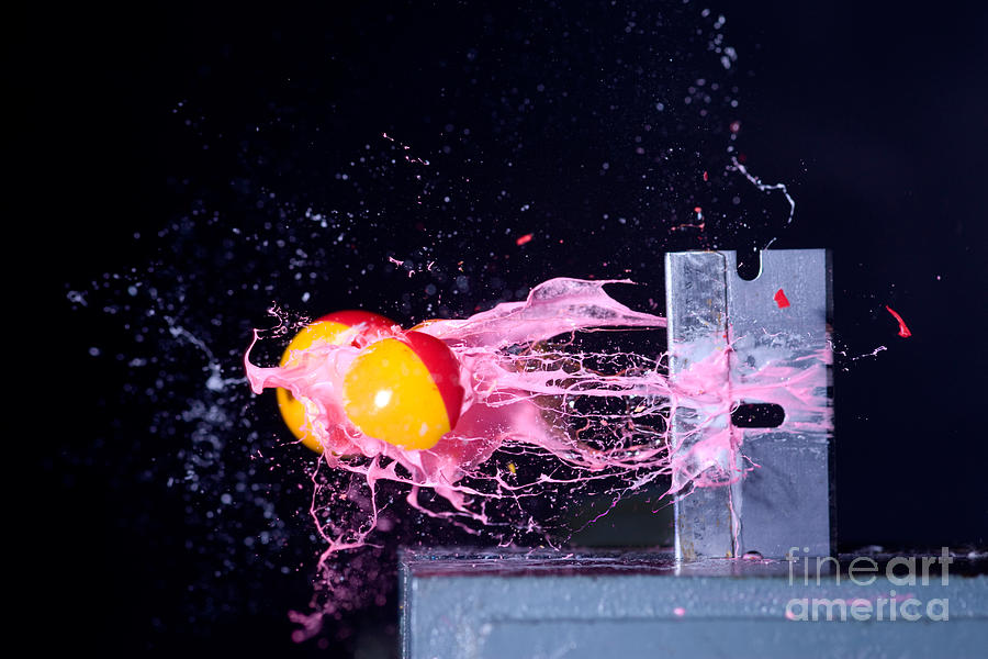 Paintball Shot At Razor Blade Photograph by Ted Kinsman