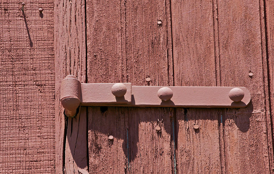 Painted Red Iron Hinge on a Red Barn Door Photograph by David Letts