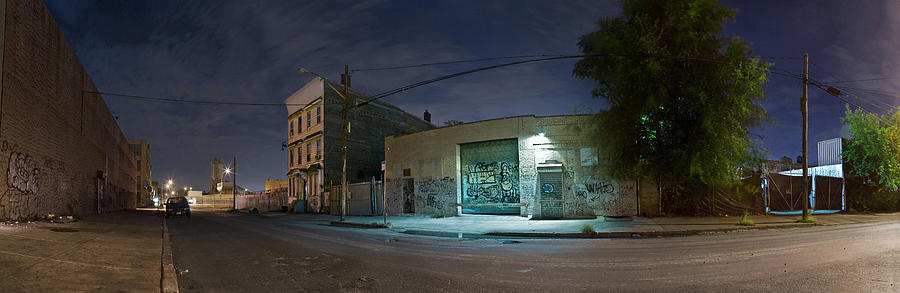 Panorama Of City Street At Night Photograph by Cultura/Chad Springer
