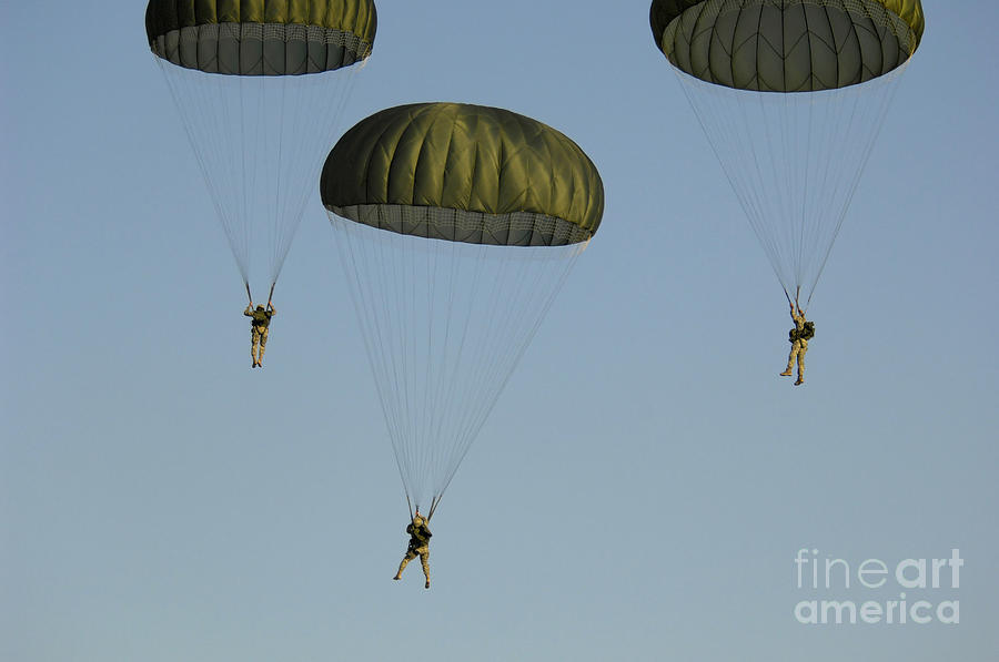 82nd Airborne Division Photograph - Paratroopers Descend Through The Sky by Stocktrek Images