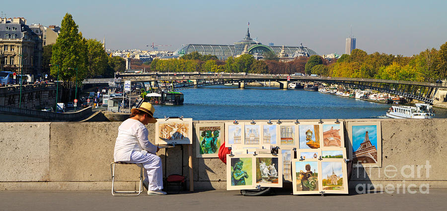 PARISIAN ARTIST an artist displays her work on a bridge over the Seine Photograph by Louise Heusinkveld