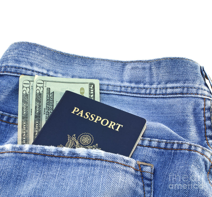 Airport Photograph - Passport in jeans pocket by Blink Images