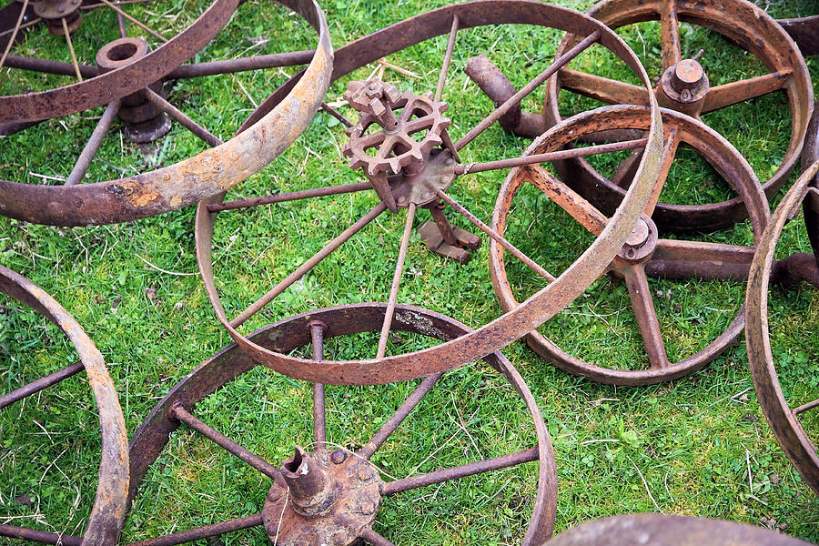 Patterns with Old Pulleys Photograph by Steve McKinzie