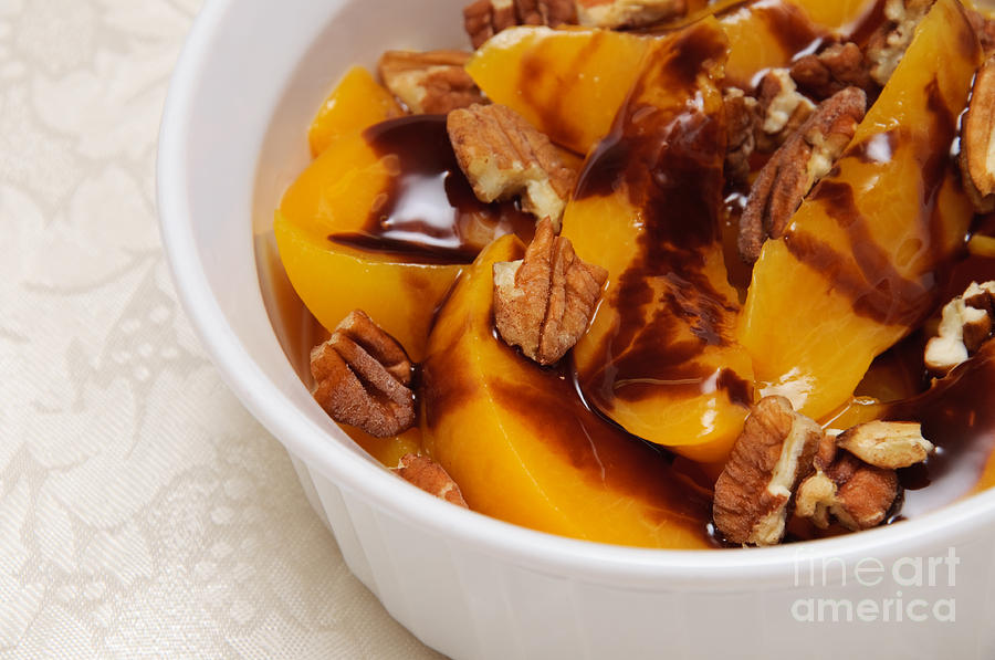 Peaches With Chocolate Drizzle And Pecans Photograph by Andee Design