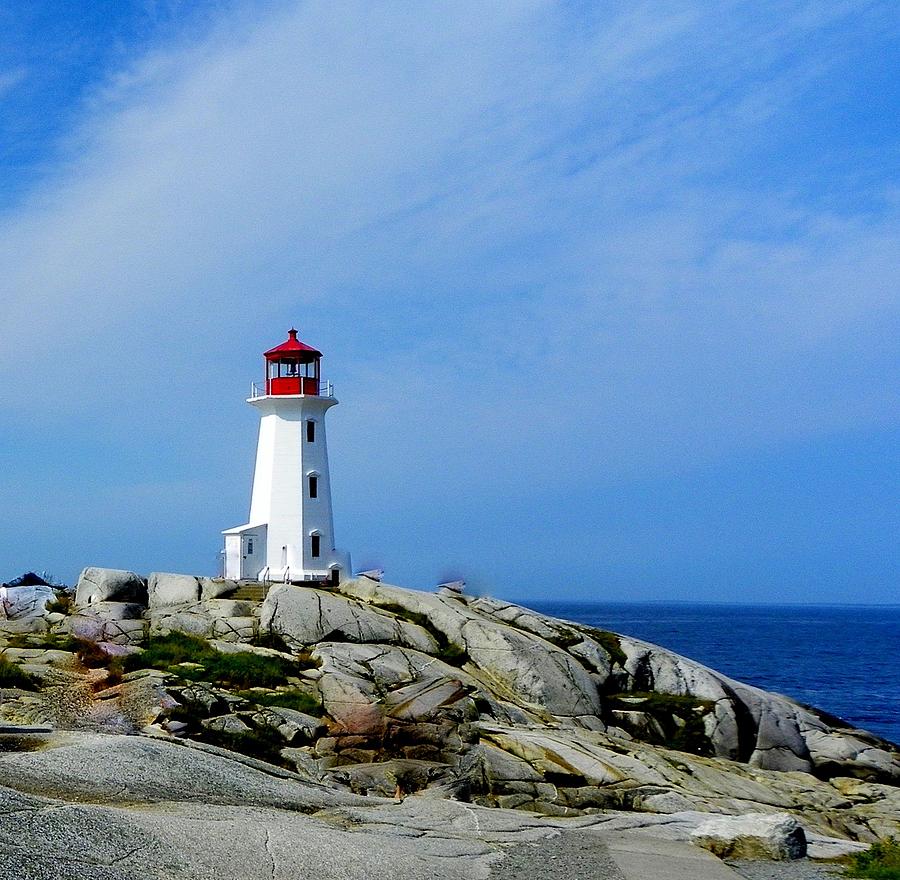 Peggys Cove lighthouse Photograph by Bill Hosford