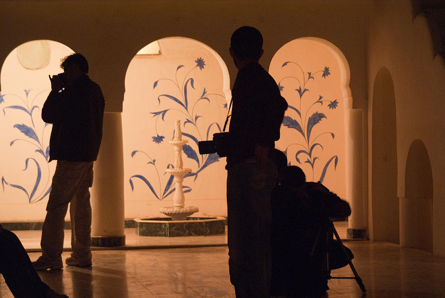 Photographers in silhouette at a heritage building in Rajasthan in India Photograph by Ashish Agarwal