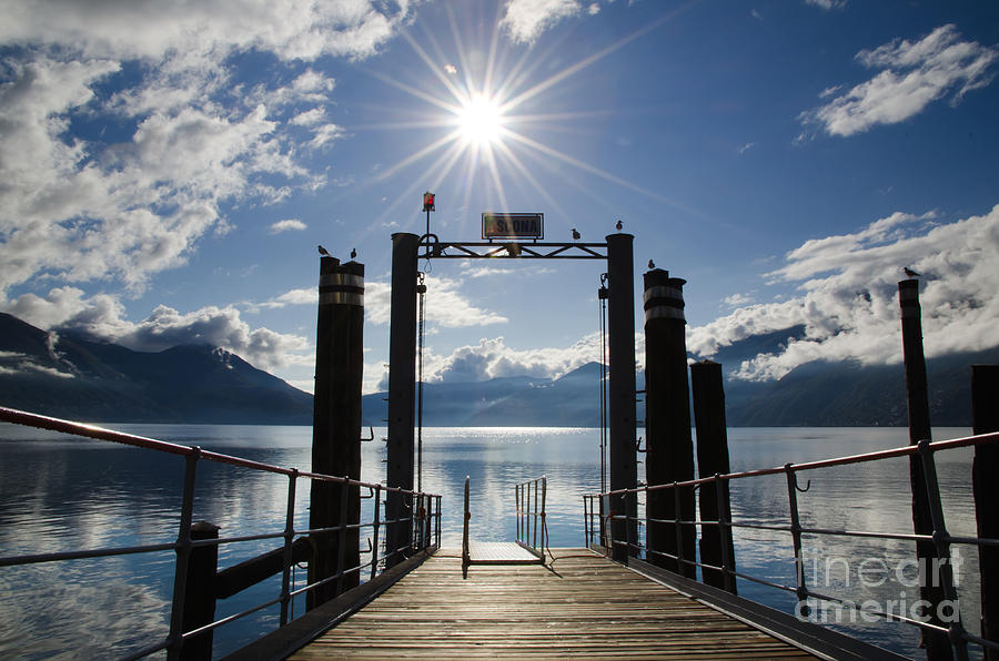 Pier and sunshine Photograph by Mats Silvan