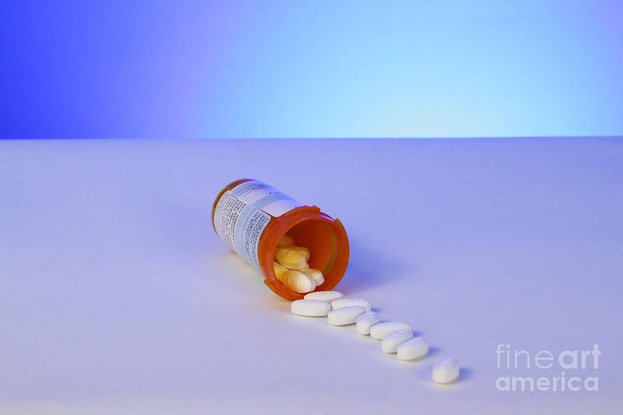 Still Life Photograph - Pills Spilling Out Of A Medicine Bottle by Photo Researchers, Inc.