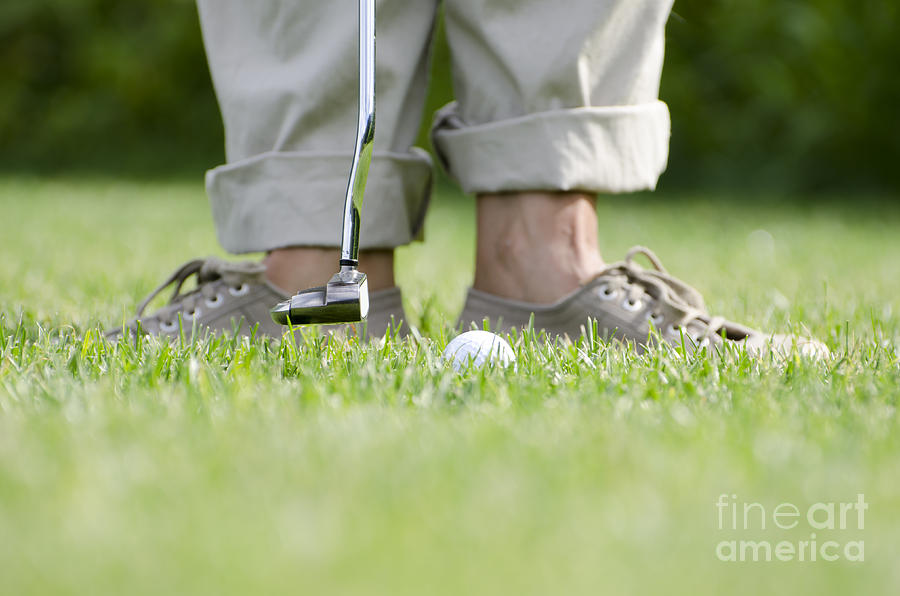 Playing golf Photograph by Mats Silvan