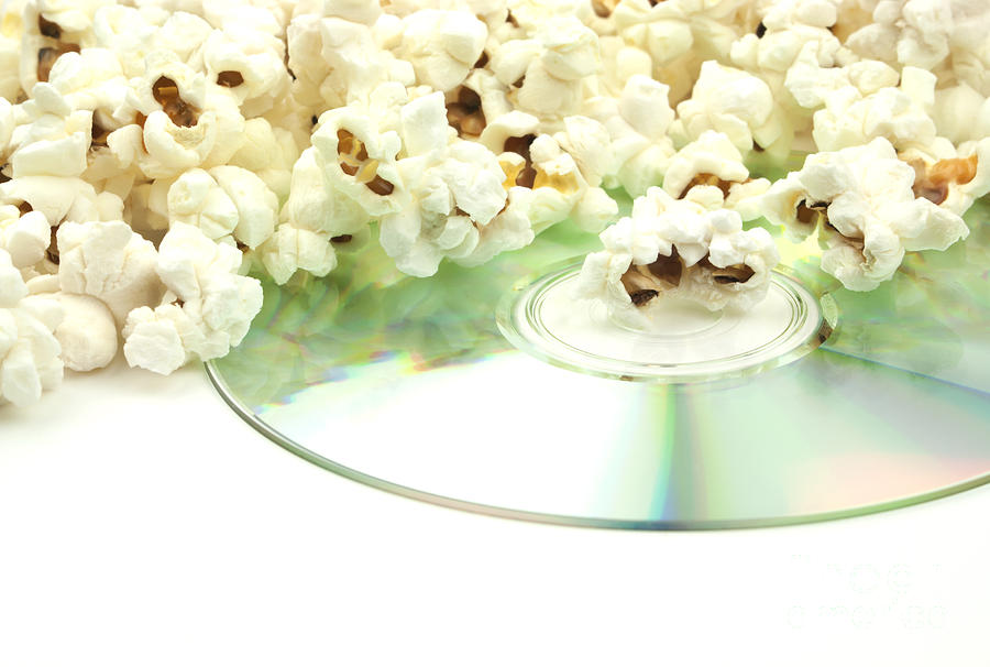 Popcorn Photograph - Popcorn and movie  by Blink Images