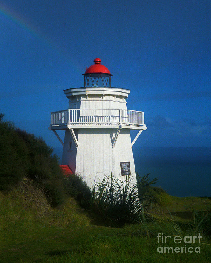 Pouto Lighthouse with Rainbow New Zealand Photograph by Mark Dodd
