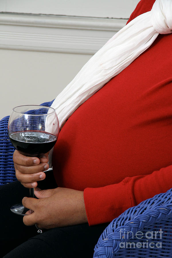 Pregnant Woman Drinking Wine Photograph by Photo Researchers