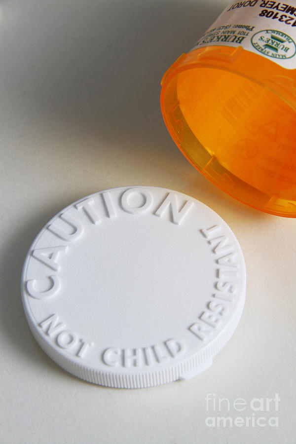 Prescription Pill Bottle With Child Photograph by Photo Researchers, Inc.