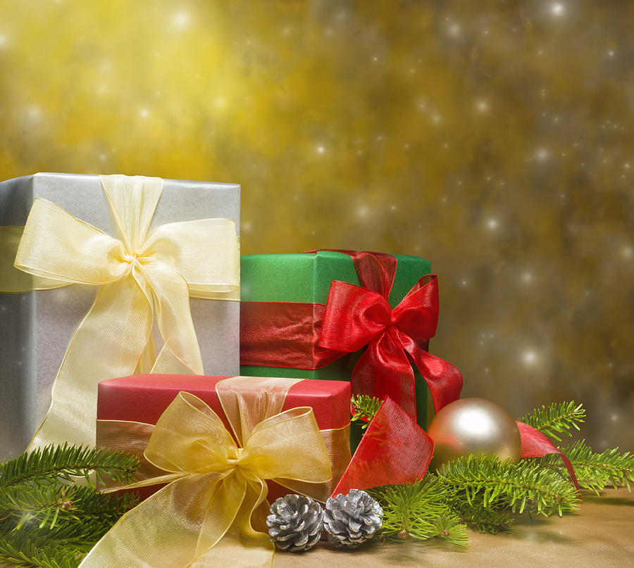 Christmas Photograph - Presents decorated with Christmas decoration by U Schade