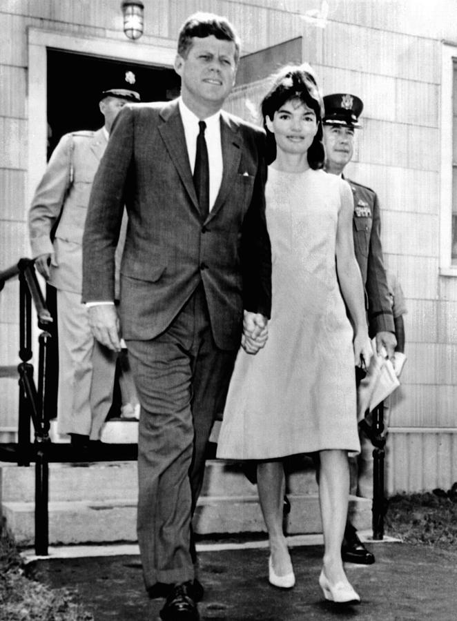 Politician Photograph - President And Jacqueline Kennedy Walk by Everett