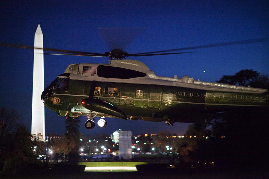 President Obama Reading As Marine One by Everett