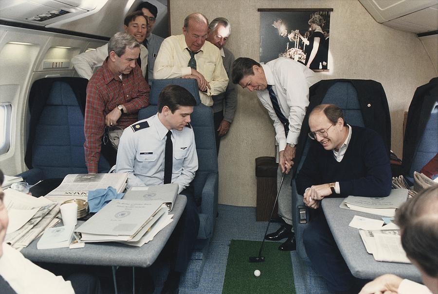 Sports Photograph - President Reagan Putting A Golf Ball by Everett