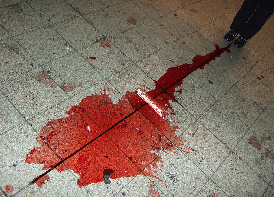 Puddle of red wine on the floor Photograph by Matthias Hauser