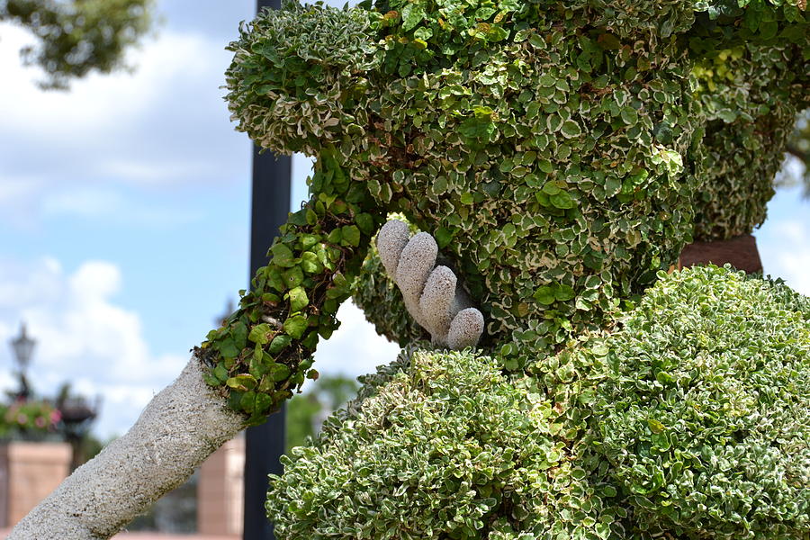 Epcot Photograph - Pulling Her Close by Bonnie Myszka