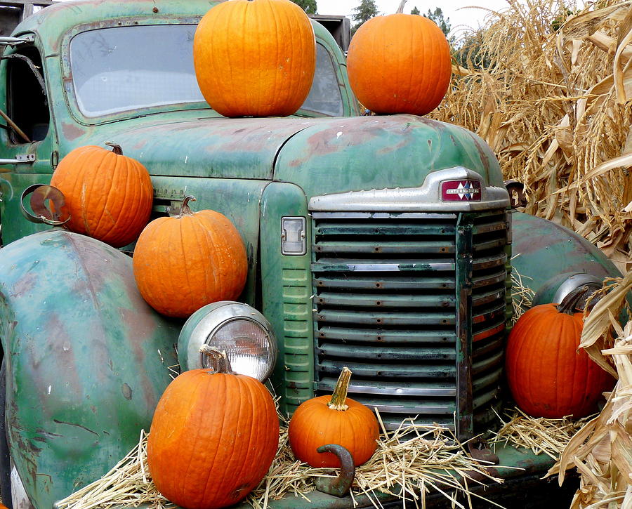 Pumpkins On Old Truck Photograph by Jeff Lowe