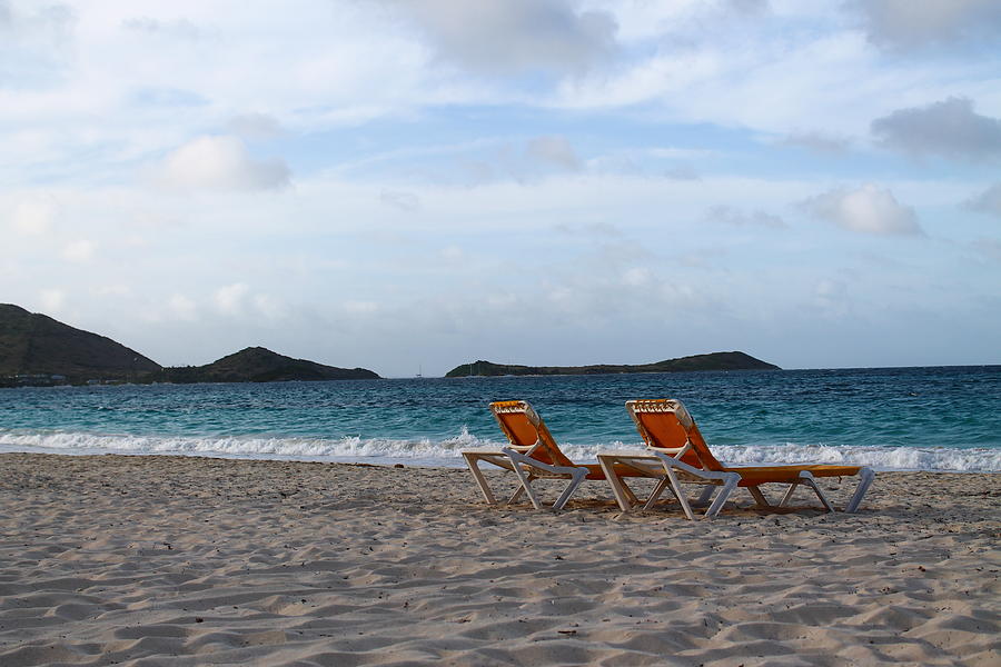 Quiet beach chairs Photograph by Catie Canetti
