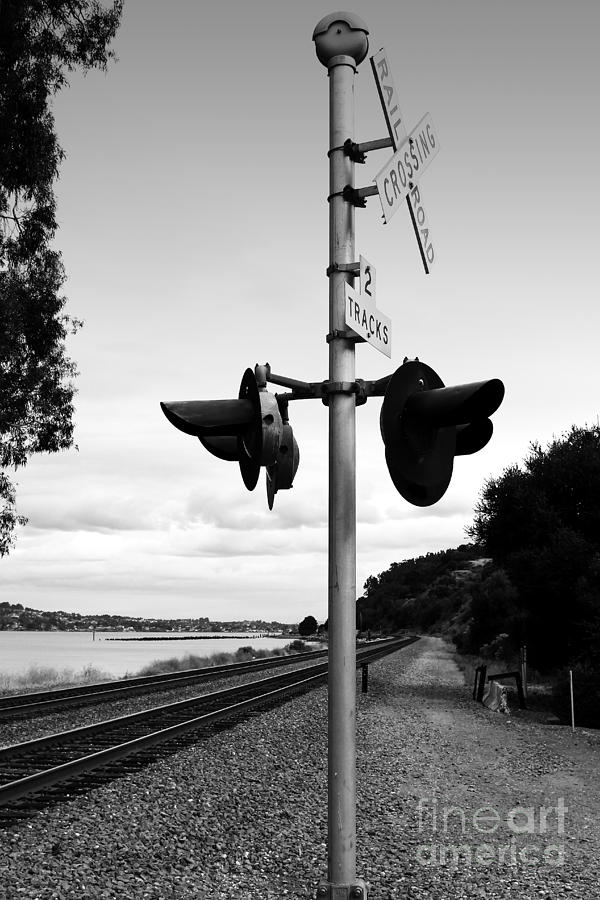 Railroad Crossing Light . Black and White Photograph by Wingsdomain Art and Photography