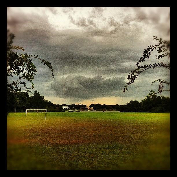 Orlando Photograph - rain On The horizon in orlando Florida by James Roberts