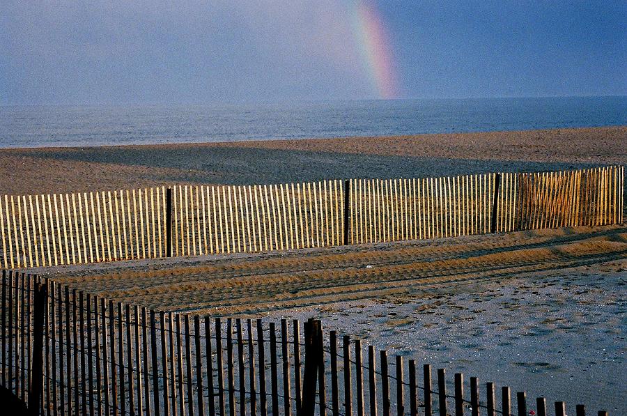 Beach Photograph - Rainbow At Sunset by William Walker