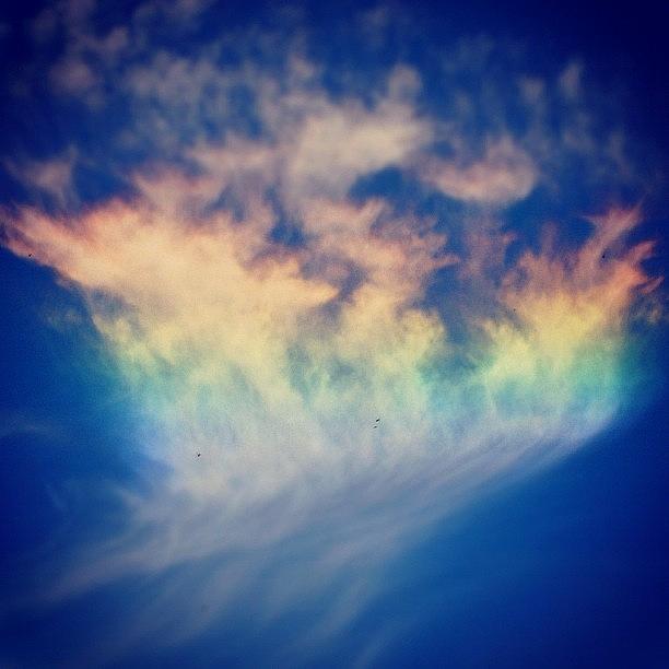 Nature Photograph - #rainbow #clouds #sky #blue #phenomenon by Loghan Call