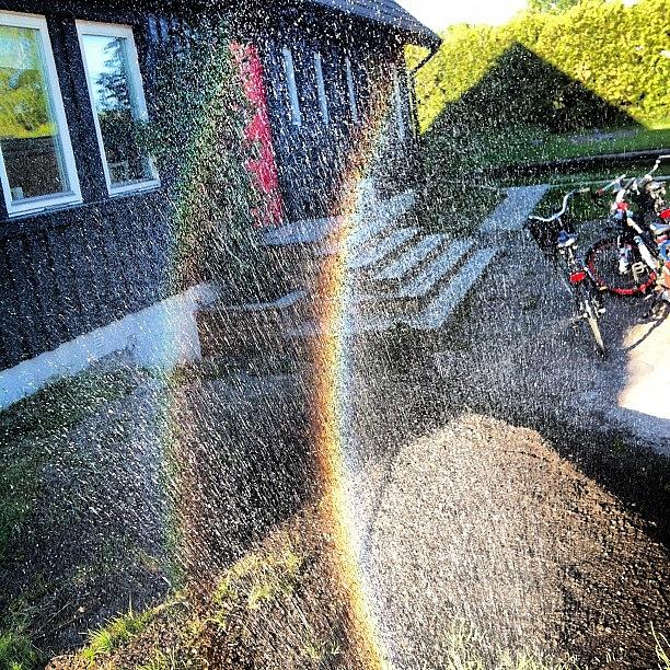 Summer Photograph - Rainbow touchdown by Mikael Andersson