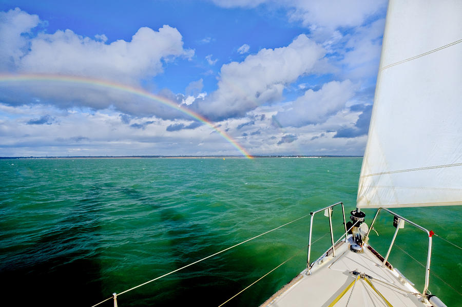 Rainbows off the port bow Photograph by Gary Eason
