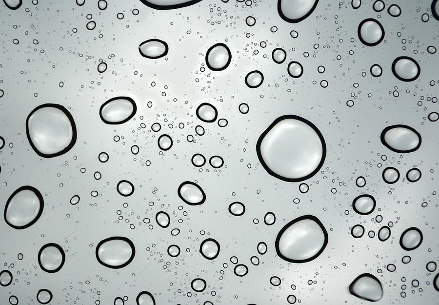 Black And White Photograph - Raindrop Refrations Of The Sky by Sandi OReilly