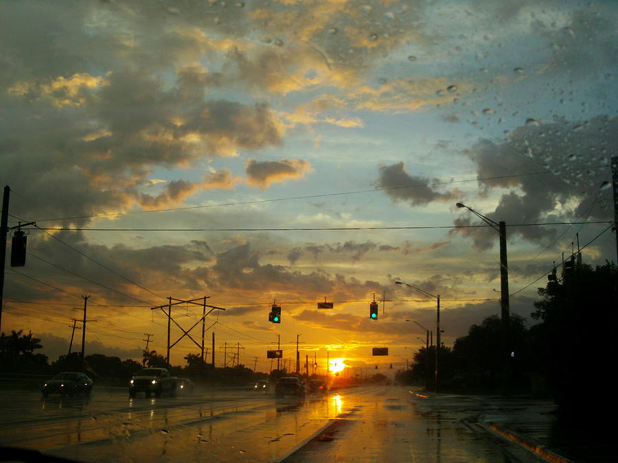 Rainy Sunset Photograph by Lisa Pedro