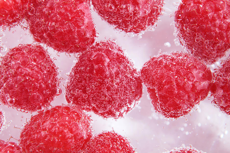 Raspberries In Sparkling Water Photograph by Stock4b-rf