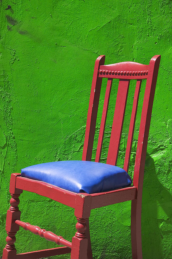 Red chair green wall Photograph by Garry Gay