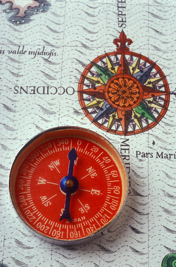 Map Photograph - Red compass and rose compass by Garry Gay