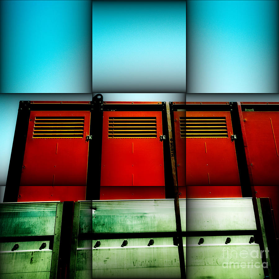 Red industrial lockers set against a blue sky makes for colorful modern abstract. Photograph by Emilio Lovisa