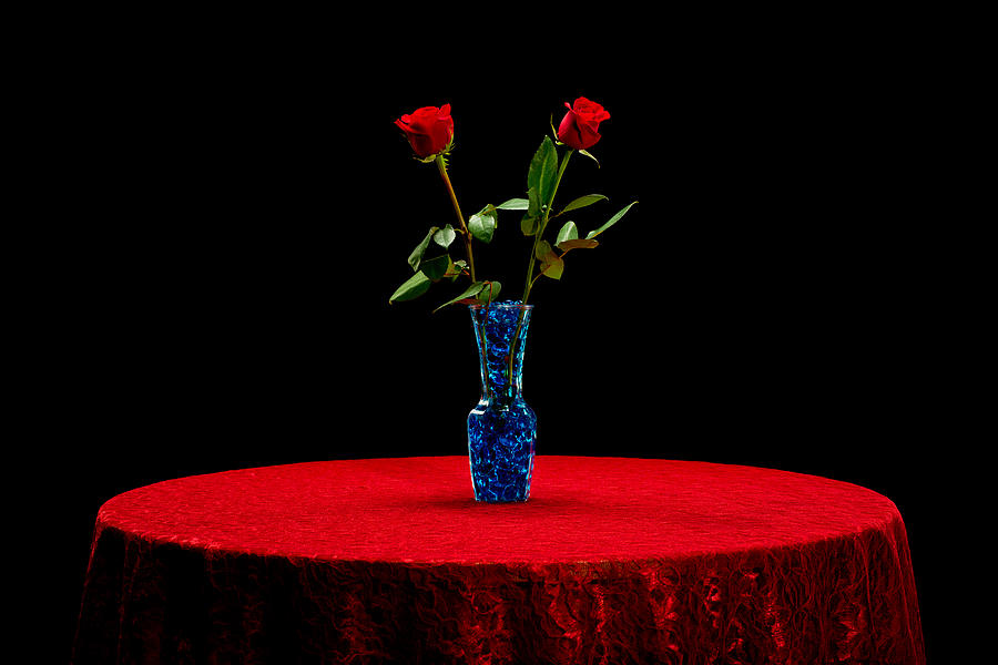 Red roses on a table Photograph by Jim Boardman