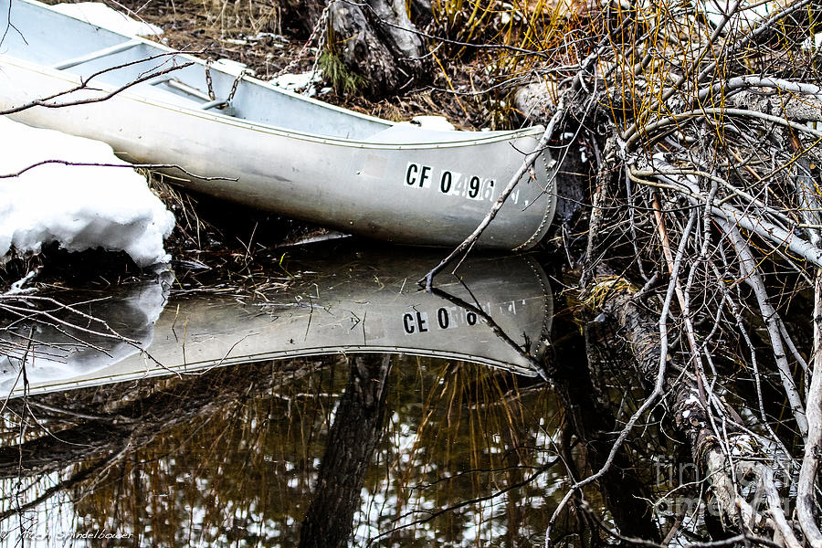 Refleceting Canoe Photograph