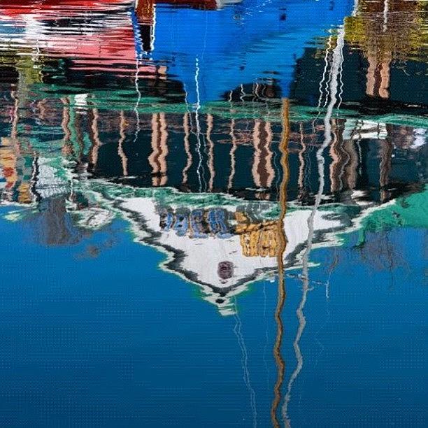 Beach Photograph - #reflection #joescrabshack #water #blue by Michael Lynch