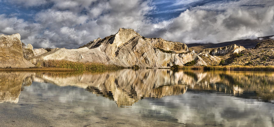 Reflection On Blue Lake In St Bathans Photograph by Colin Monteath