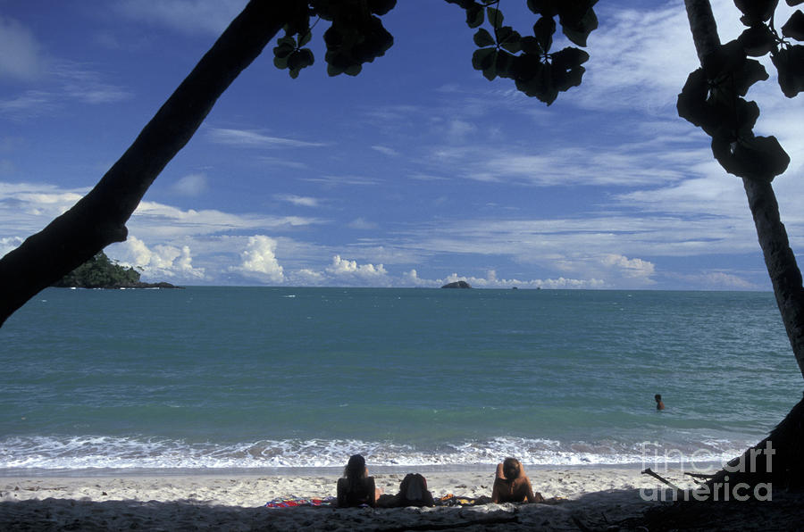 RELAXING ON THE BEACH  Manuel Antonio Park Costa Rica Photograph by John  Mitchell