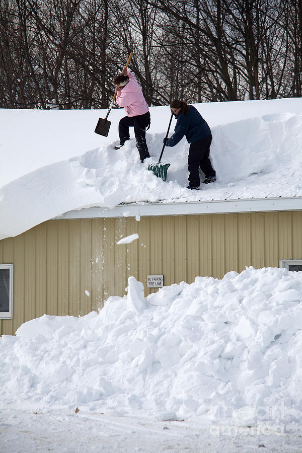 Removing Snow From A Building Photograph by Ted Kinsman