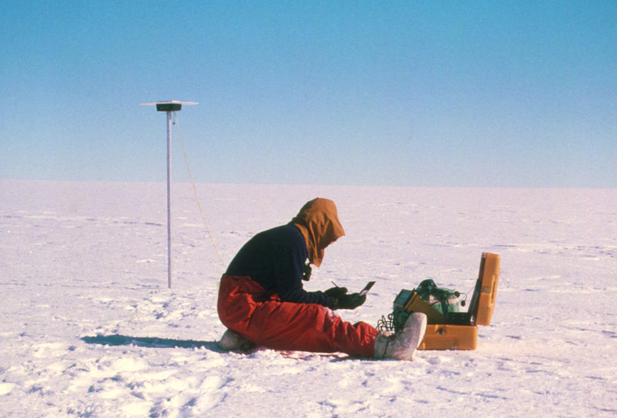 Ice Photograph - Researcher Measures The Flow Rate Of A Glacier by David Vaughan