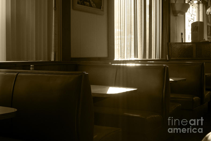 Restaurant Booth With Streaming Sunlight in Sepia Photograph by Susan Stevenson