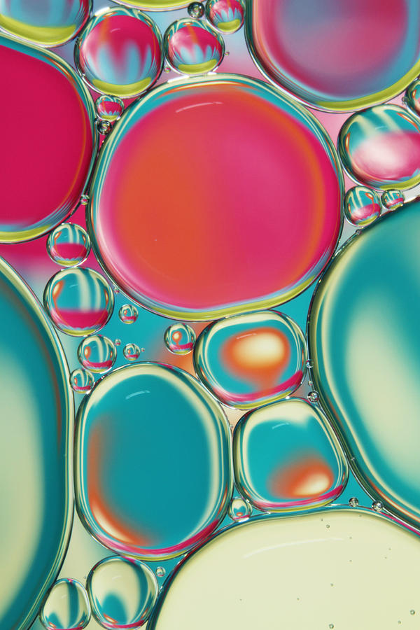 Retro Coloured Oil and Water Drops Photograph by Sharon Johnstone