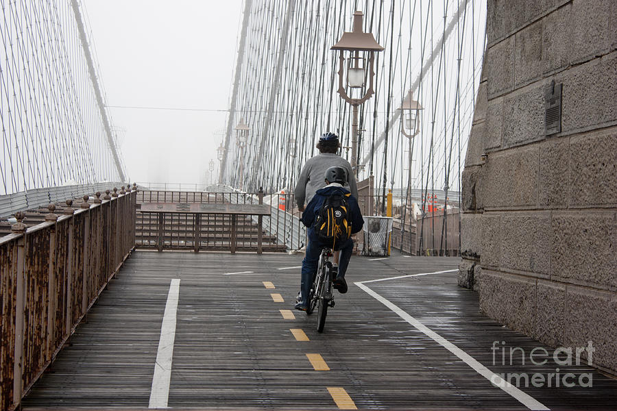Brooklyn Bridge Photograph - Riding the bridge by David Bearden
